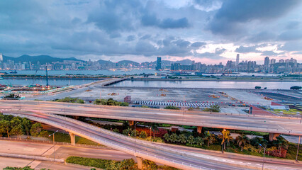 Hong Kong day to night, aerial view from kowloon bay downtown timelapse