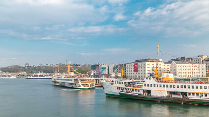 Fototapeta premium Tourist ship and ferries traffic on Bosphorus timelapse view from Galata Bridge in Istanbul, Turkey
