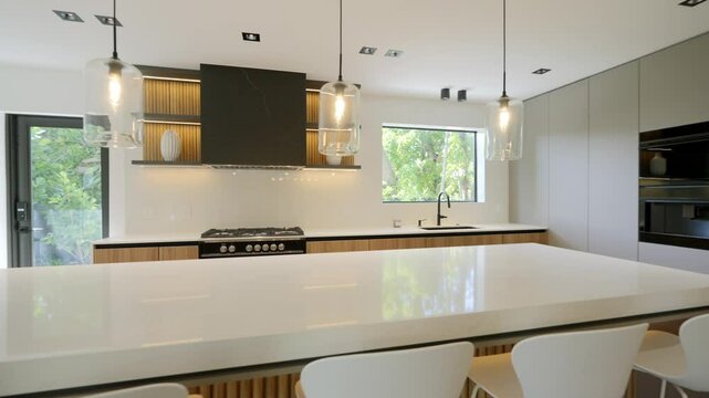 Expensive renovation idea for kitchen in spacious house with modern appliances and designed furniture. Thoughtful interior rental apartments with private access