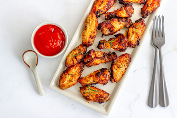 Air Fryer Chicken Wings with Condiments Top Down Photo, Healthy Chicken Appetizer 