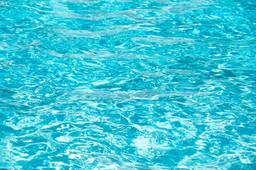 Blue ripped water in swimming pool, water pool texture and surface water backgraund.