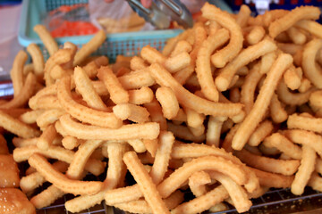 Crispy fried dough or sweet dessert, delicious taste.