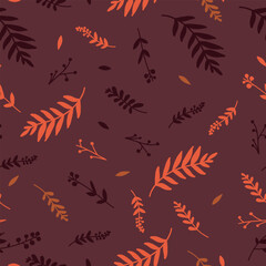 Seamless pattern in the form of autumn and winter elements of flowers, leaves, branches.