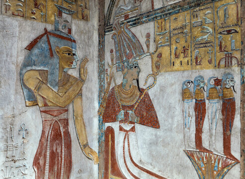 Reliefs  of the egyptian goddess Isis and the god Osiris in the tomb of Tausert and Setnakht in the valley of the kings . Luxor. Egypt.