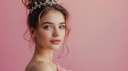 beautiful sixteen girl with dress and crown on pink background