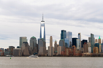Obraz premium New York with city skyline. Cityscape of NYC Manhattan. Skyscraper cityscape of New York, Manhattan. Skyscraper architecture panorama. New York cityscape with skyscraper architecture. Panoramic view