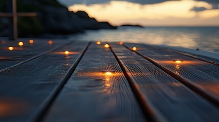 Close-up of spotlight deck lights casting soft glows on a wooden surface, with a serene evening backdrop.
