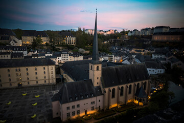 Fototapeta premium Luxembourg city seen from the surrounding high walls after dusk