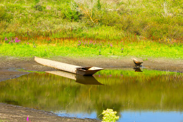 A pipe for draining water from the lake.