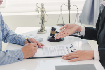 Lawyer accepts bribe in office, concept of corruption and bribery of lawyer with legal documents, scales of justice and hammer