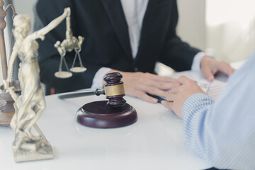 Lawyer accepts bribe in office, concept of corruption and bribery of lawyer with legal documents, scales of justice and hammer