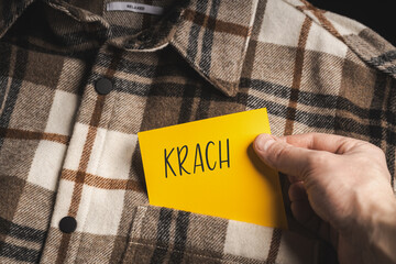 Yellow card with a handwritten inscription 