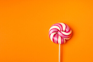 Color lollipop, spiral candy on stick, colorful striped lollypop, round fruit caramel, circle lollipop