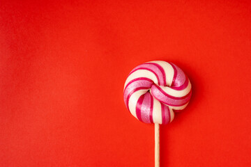 Color lollipop, spiral candy on stick, colorful striped lollypop, round fruit caramel, circle lollipop