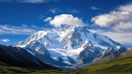 Mountain range landscape panorama with a glacier and dramatic clouds