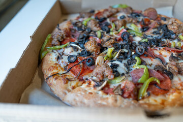 Closed up of a sausage pizza