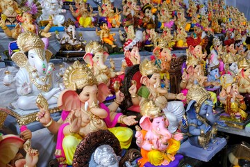 31 August 2024, Pune, India, Ganesha or Ganapati for sale at a shop on the event of Ganesh festival in India, Eco friendly God Ganesha Statue made from clay.