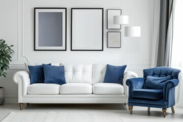 Fototapeta premium White sofa and blue armchair in living room with posters on the wall