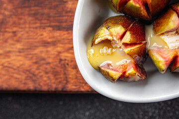 baked figs fruit with cheese fresh meal food snack on the table copy space food background rustic top view 