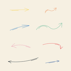 Colorful hand drawn arrows on a beige background