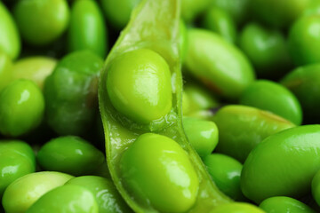 Fresh edamame pod on soybeans, closeup view