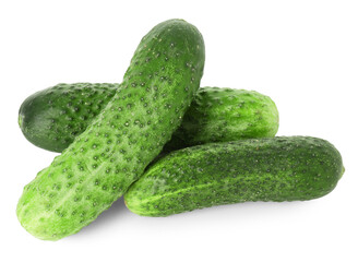 Three whole fresh cucumbers isolated on white