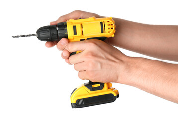Man with cordless electric drill on white background, closeup