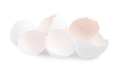 Pile of broken eggshells isolated on white