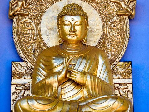 Closeup on a golden buddha statue