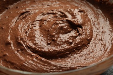 Fresh chocolate dough in bowl, closeup view