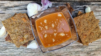 Minced meat, baked in the oven oriental style in a menu with garlic soup