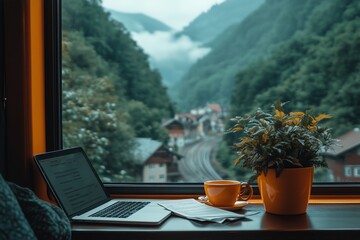  A person working remotely on a laptop while traveling by train through picturesque mountain...