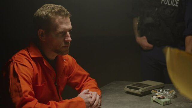 Group of police questions for inmate in investigation