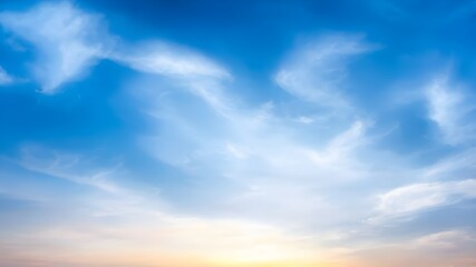 Obraz premium The morning sky looked like a bright golden sky. The sunrise is decorated with clouds in various shapes. Looks beautiful. 