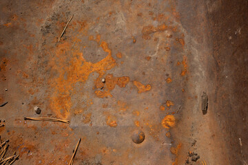 Close-up of rust on an old wheelbarrow.  