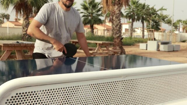 sportsman man training playing table tennis. forehand and backhand exercise lifestyle in ping pong.