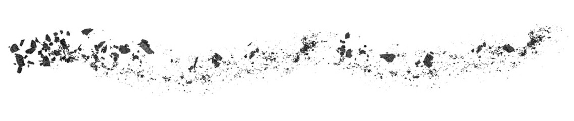 Fototapeta premium Pieces or dust of charcoal isolated on a white background, top view. Particles of charcoal.