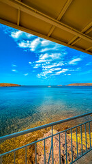 sailing boat anchored in the bay of sigri town of lesbos island greece clouds and islands