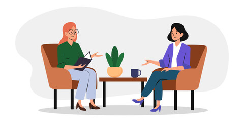 Discussion between two people in a cozy setting with plants and a coffee mug