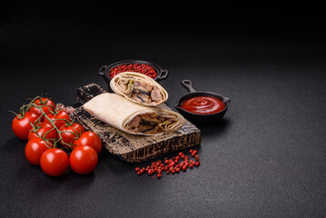 Delicious traditional shawarma or doner kebab with beef, mushrooms