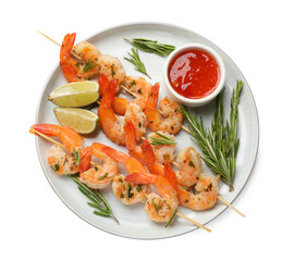 Skewers with delicious grilled shrimps, lime and sauce isolated on white, top view