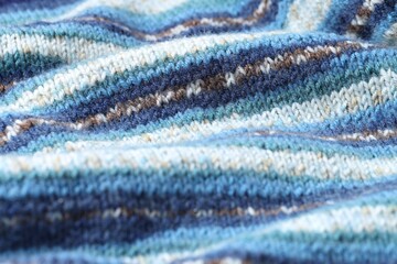 Texture of colorful knitted fabric as background, closeup