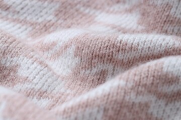 Texture of knitted fabric with pattern as background, closeup