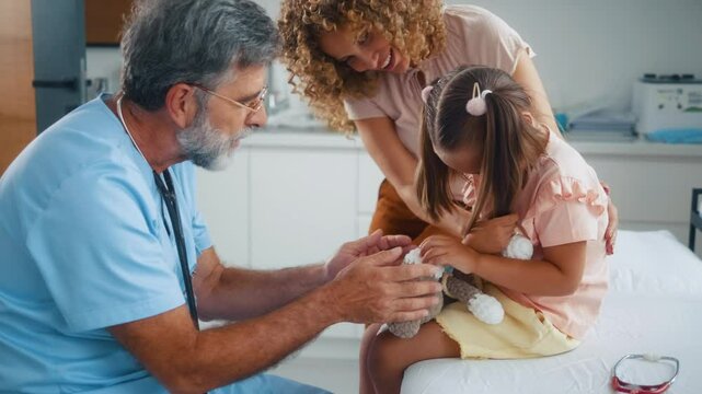 Shy or scared little girl does not want to see doctor, child feeling insecure at medical examination in hospital