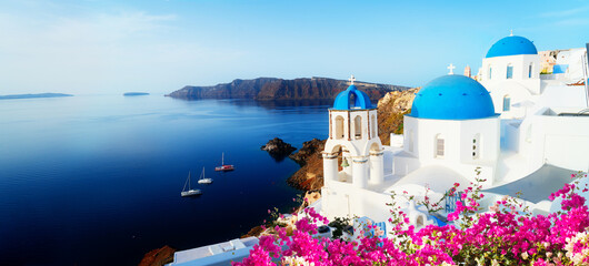 white church belfry and volcano caldera with sea landscape, beautiful details of Santorini island, Greece, banner