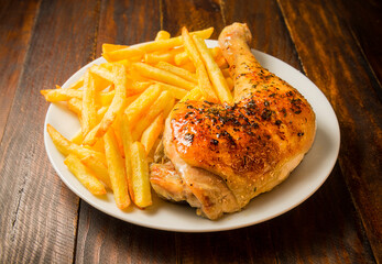 Muslo de pollo con patatas