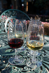 port wine testing, glasses with drink - white and red