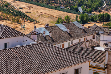 Aerial view of white houses in the ancient town of Ronda, Spain.