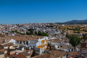 Aerial view of white houses in the ancient town of Ronda, Spain.