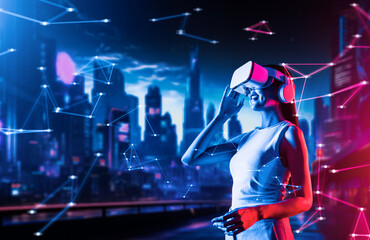 Obraz premium Female standing in cyberpunk style building in meta wear VR headset connecting metaverse, future cyberspace community technology, Woman raise right hand holding goggles looking faraway. Hallucination.